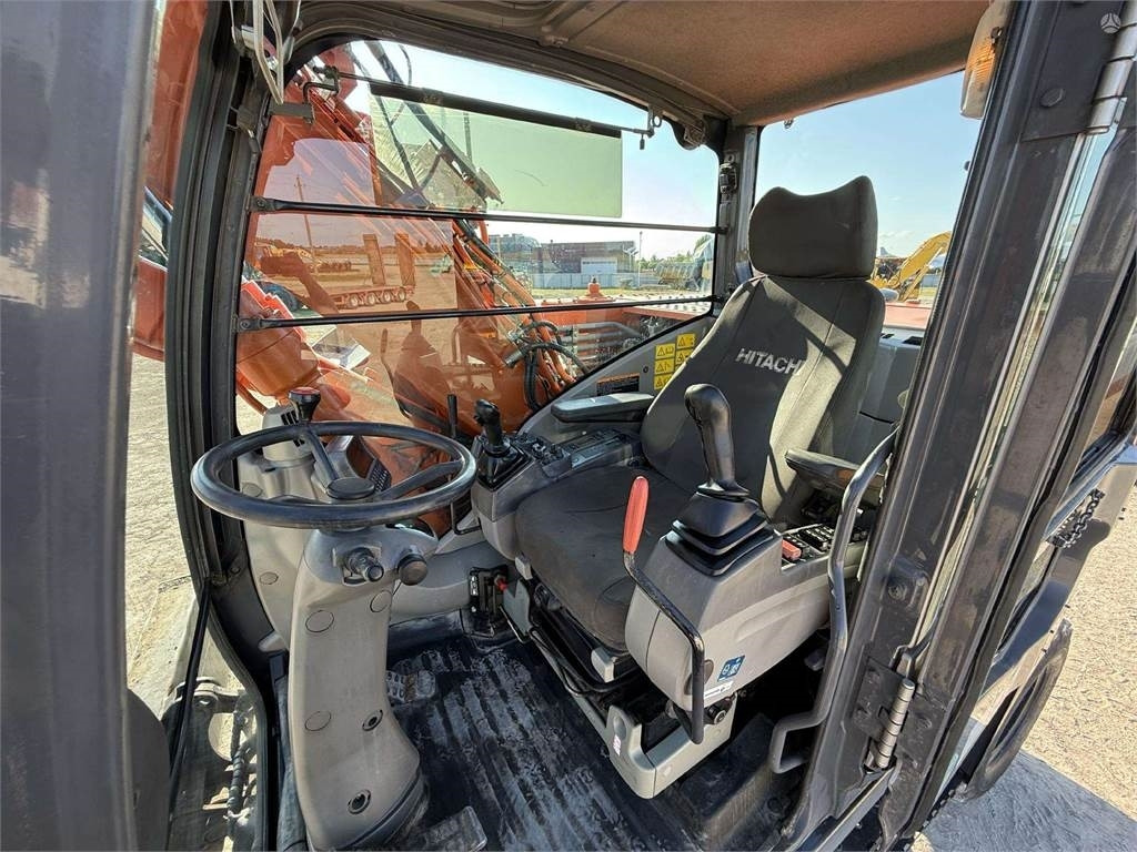 حفارة دولاب Hitachi ZX 140 W: صورة 10