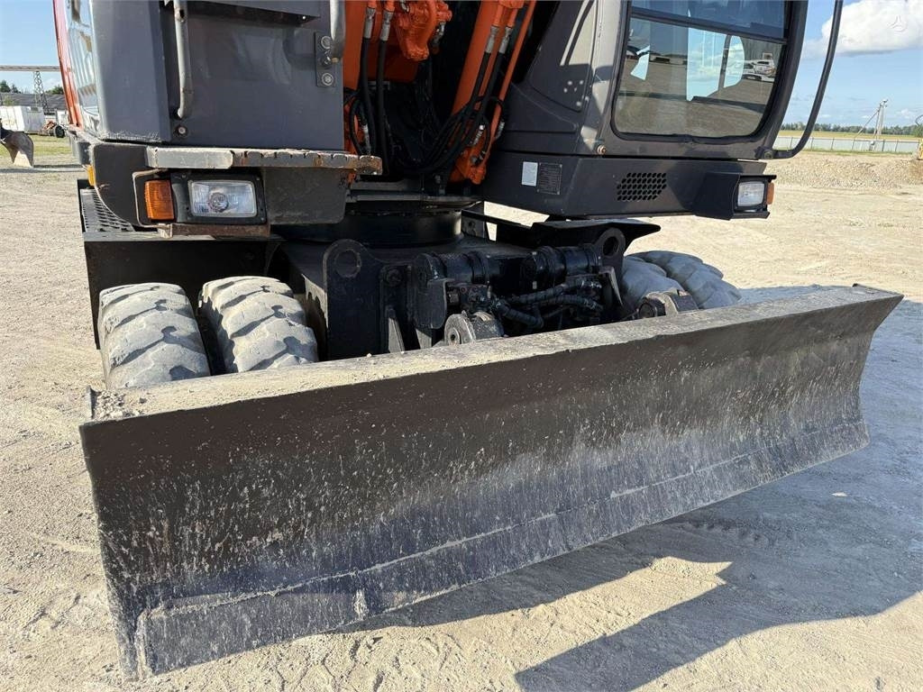 حفارة دولاب Hitachi ZX 140 W: صورة 19