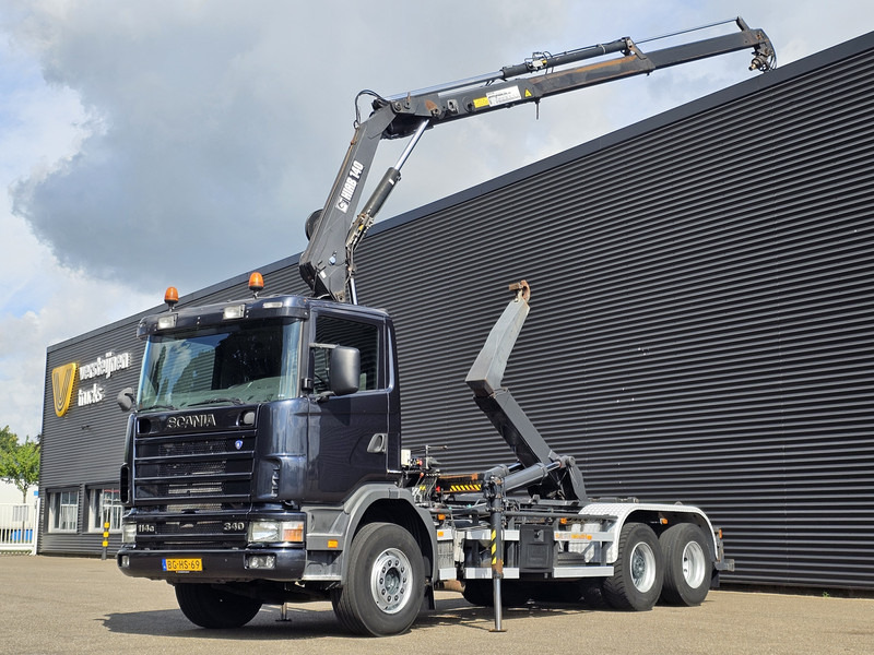 Scania R114.340 6x2 / HIAB CRANE + 25T HOOKLIFT - شاحنة ذات خطاف, شاحنة كرين: صورة 1 Scania R114.340 6x2 / HIAB CRANE + 25T HOOKLIFT - شاحنة ذات خطاف, شاحنة كرين: صورة 1