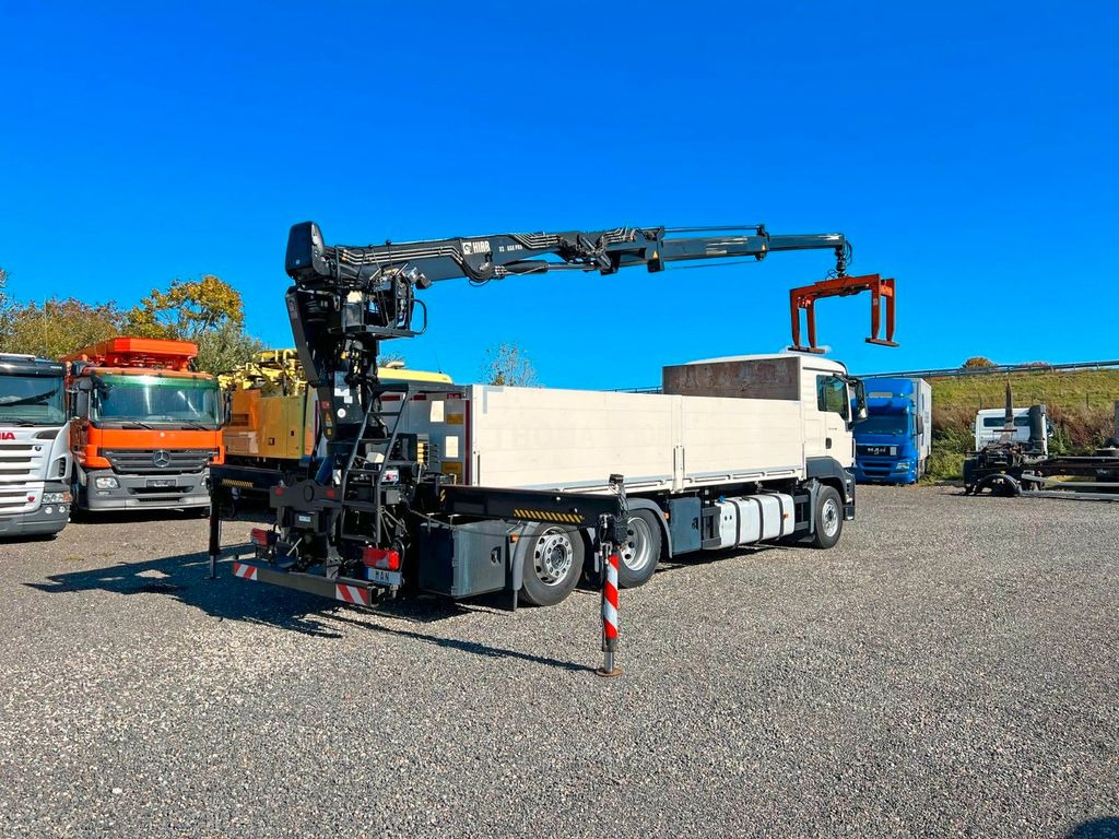 MAN 26.480 6X2 Baustoff mit Kran HIAB Top Zustand - شاحنة كرين, شاحنات مسطحة: صورة 1 MAN 26.480 6X2 Baustoff mit Kran HIAB Top Zustand - شاحنة كرين, شاحنات مسطحة: صورة 1