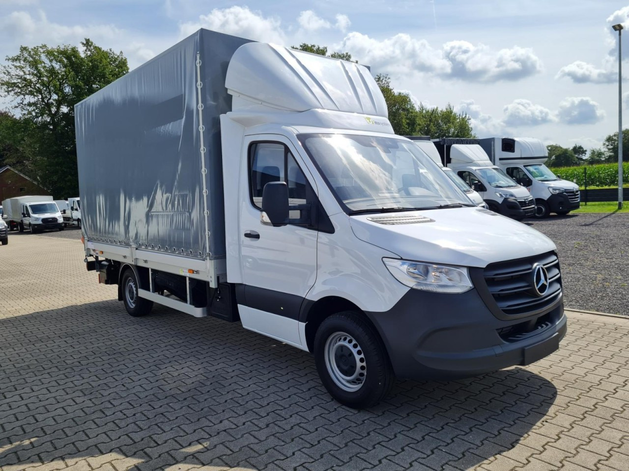 Mercedes-Benz Sprinter 315 RWD Pritsche Schiebe Plane LBW KLIMA TEMPOMAT - شاحنة ستارة جانبية: صورة 4 Mercedes-Benz Sprinter 315 RWD Pritsche Schiebe Plane LBW KLIMA TEMPOMAT - شاحنة ستارة جانبية: صورة 4