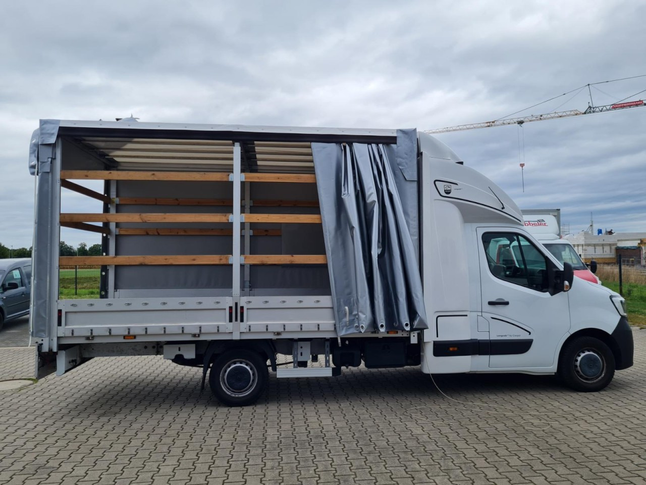Renault Master 35 Pritsche Schiebe Plane Schlafkab LUFTFEDERUNG - شاحنة ستارة جانبية: صورة 4 Renault Master 35 Pritsche Schiebe Plane Schlafkab LUFTFEDERUNG - شاحنة ستارة جانبية: صورة 4