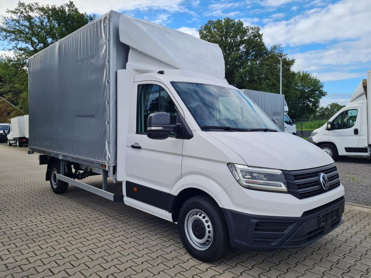 Volkswagen Crafter 35 TDI Pritsche Schiebe Plane ERGO LED T - شاحنة ستارة جانبية: صورة 3 Volkswagen Crafter 35 TDI Pritsche Schiebe Plane ERGO LED T - شاحنة ستارة جانبية: صورة 3