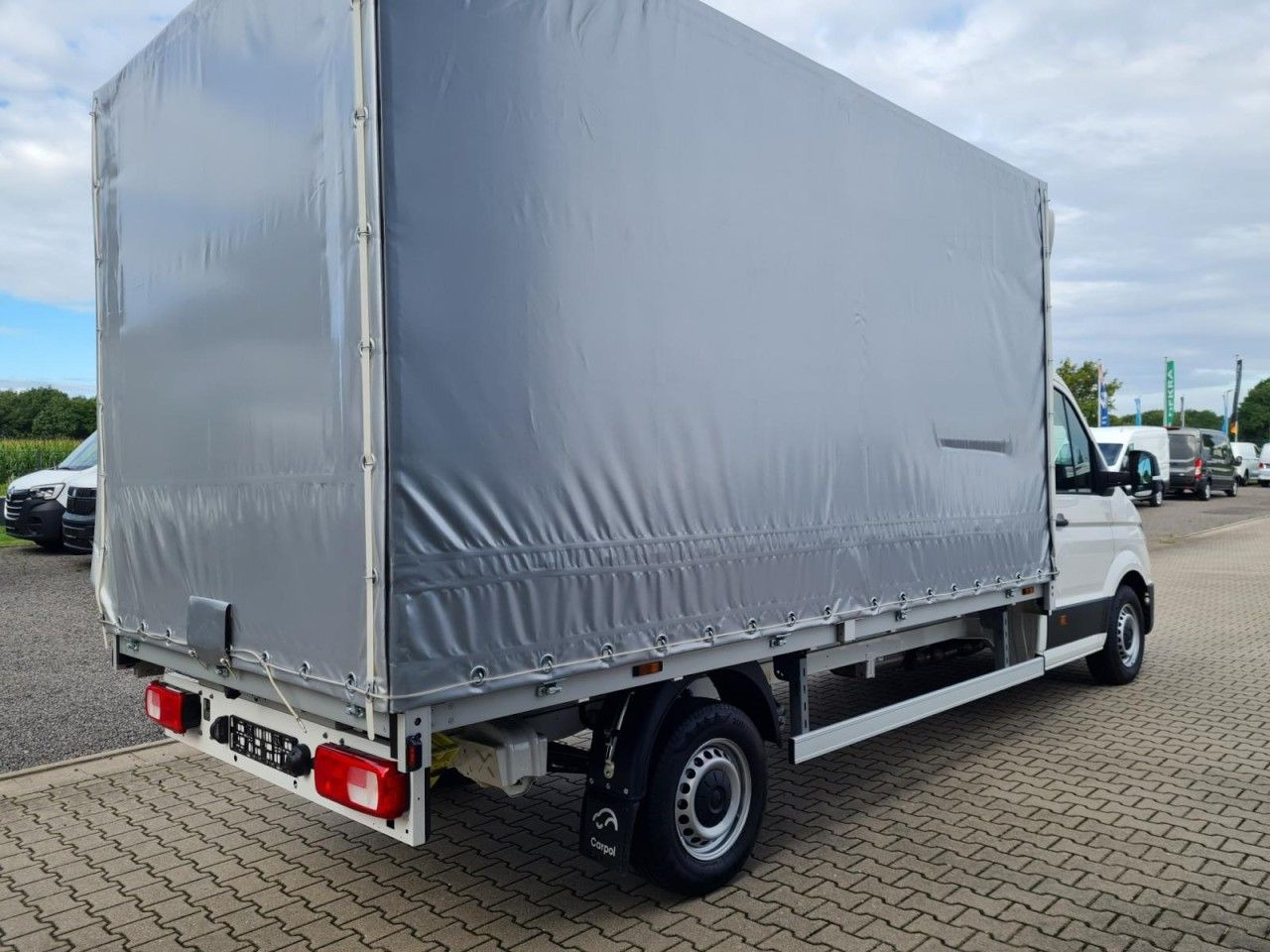 Volkswagen Crafter 35 TDI Pritsche Schiebe Plane ERGO LED T - شاحنة ستارة جانبية: صورة 4 Volkswagen Crafter 35 TDI Pritsche Schiebe Plane ERGO LED T - شاحنة ستارة جانبية: صورة 4