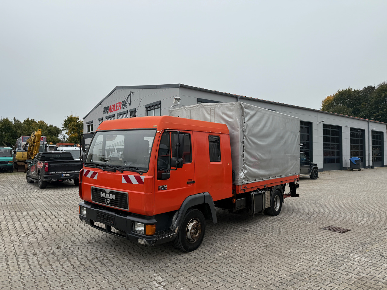 MAN 8.174 Pritsche+Plane+Ladebordwand DOKA L2000 - شاحنة ستارة: صورة 2 MAN 8.174 Pritsche+Plane+Ladebordwand DOKA L2000 - شاحنة ستارة: صورة 2