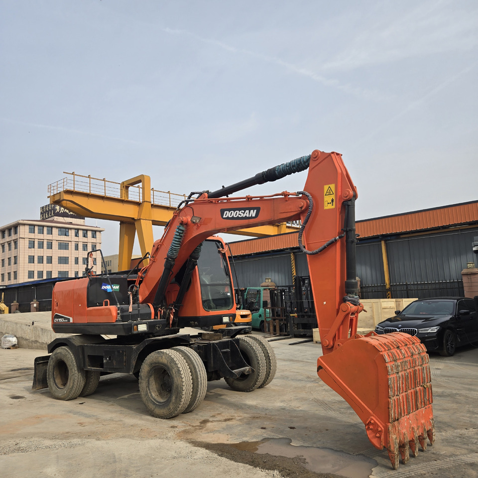 DOOSAN DX150W - حفارة دولاب: صورة 1 DOOSAN DX150W - حفارة دولاب: صورة 1