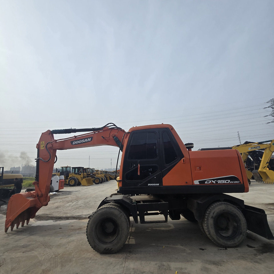 DOOSAN DX150W - حفارة دولاب: صورة 2 DOOSAN DX150W - حفارة دولاب: صورة 2