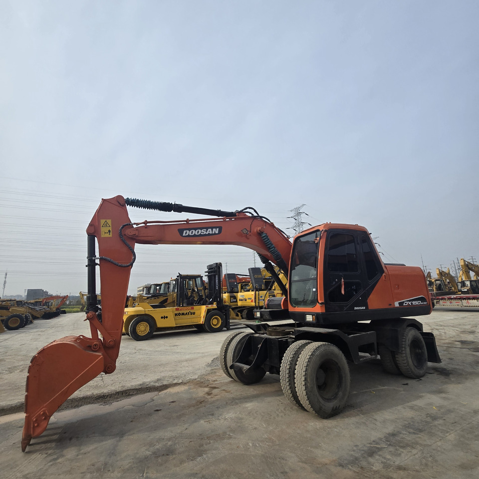 DOOSAN DX150W - حفارة دولاب: صورة 3 DOOSAN DX150W - حفارة دولاب: صورة 3