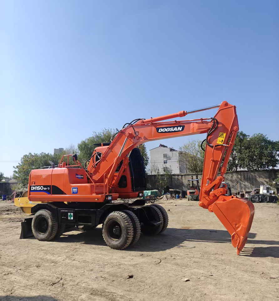 Doosan DH150W - حفارة دولاب: صورة 1 Doosan DH150W - حفارة دولاب: صورة 1