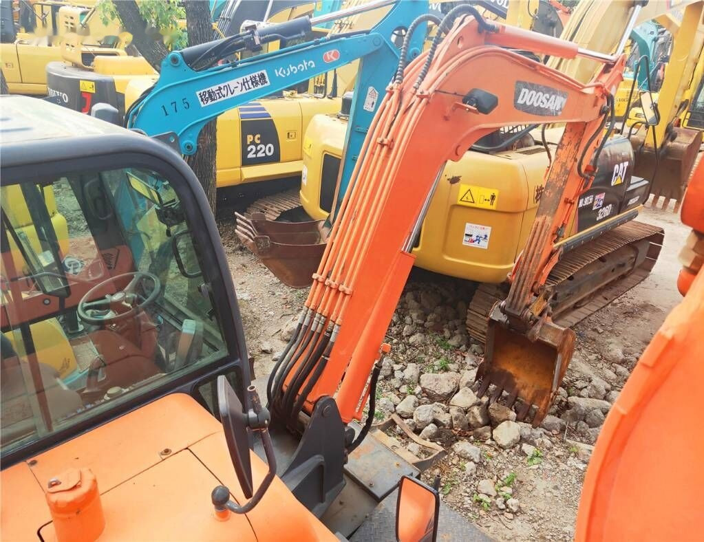 Doosan DX60 W - حفارة دولاب: صورة 3 Doosan DX60 W - حفارة دولاب: صورة 3
