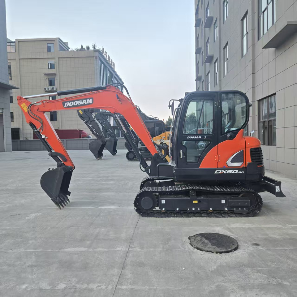 Doosan DX60 - حفارة مُصَّغرة: صورة 1 Doosan DX60 - حفارة مُصَّغرة: صورة 1
