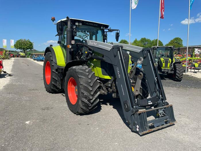 Claas Arion 650 - جرار: صورة 1 Claas Arion 650 - جرار: صورة 1