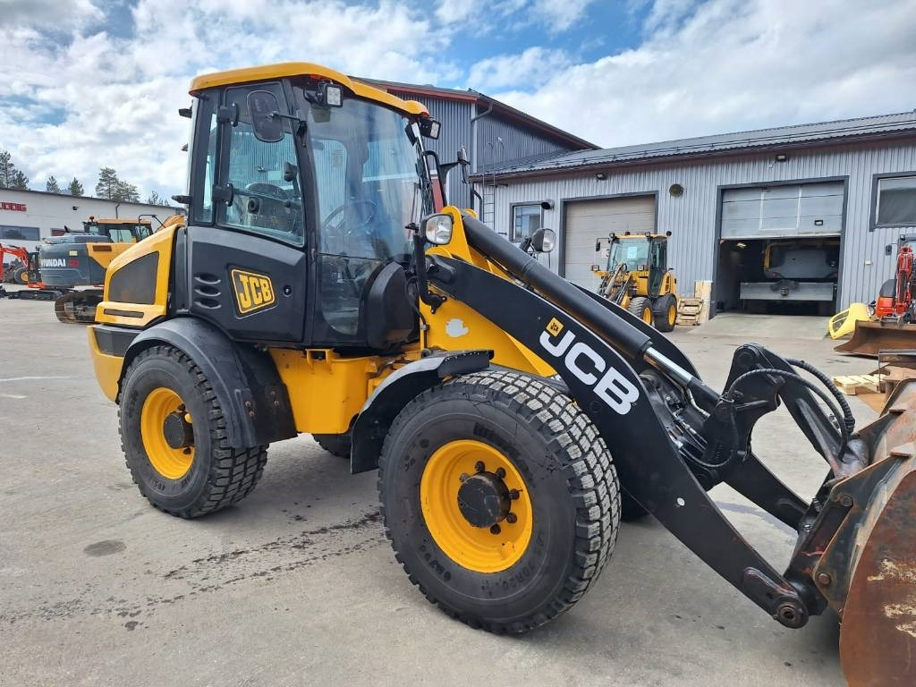 اللودر بعجل JCB 409 AURA, HIEKOITIN YM.: صورة 6