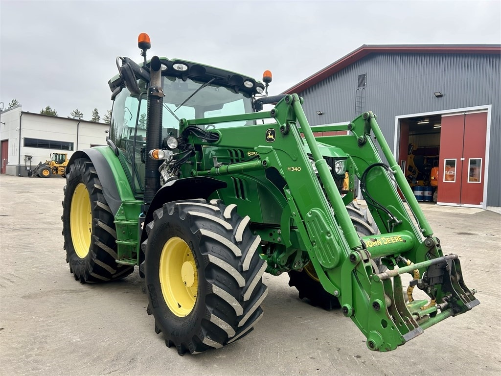 John Deere 6125 R AUTOPOWER ETUKUORMAAJALLA - جرار: صورة 4 John Deere 6125 R AUTOPOWER ETUKUORMAAJALLA - جرار: صورة 4
