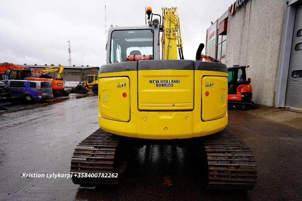New Holland E70BSR ENGCON PIHDEILLÄ - حفارة مُصَّغرة: صورة 5 New Holland E70BSR ENGCON PIHDEILLÄ - حفارة مُصَّغرة: صورة 5