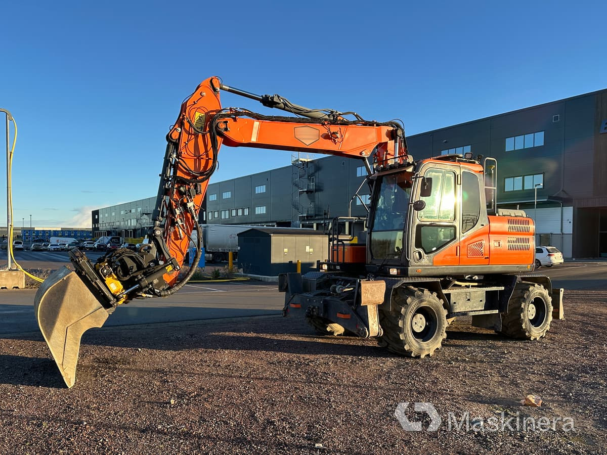 Hjulgrävare Doosan DX160W-5 - حفار زحاف: صورة 1 Hjulgrävare Doosan DX160W-5 - حفار زحاف: صورة 1
