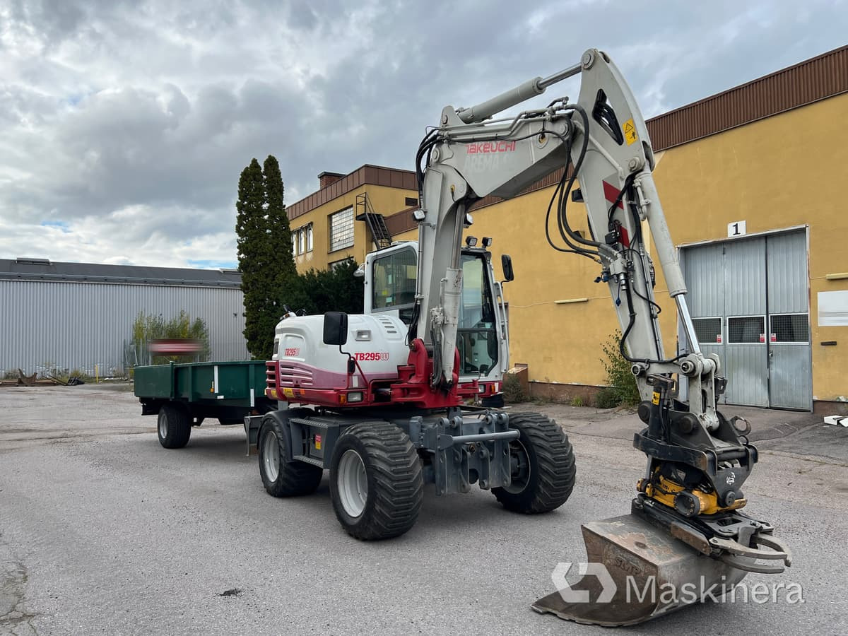 Hjulgrävare Takeuchi TB295W med vagn & redskap - حفار زحاف: صورة 3 Hjulgrävare Takeuchi TB295W med vagn & redskap - حفار زحاف: صورة 3