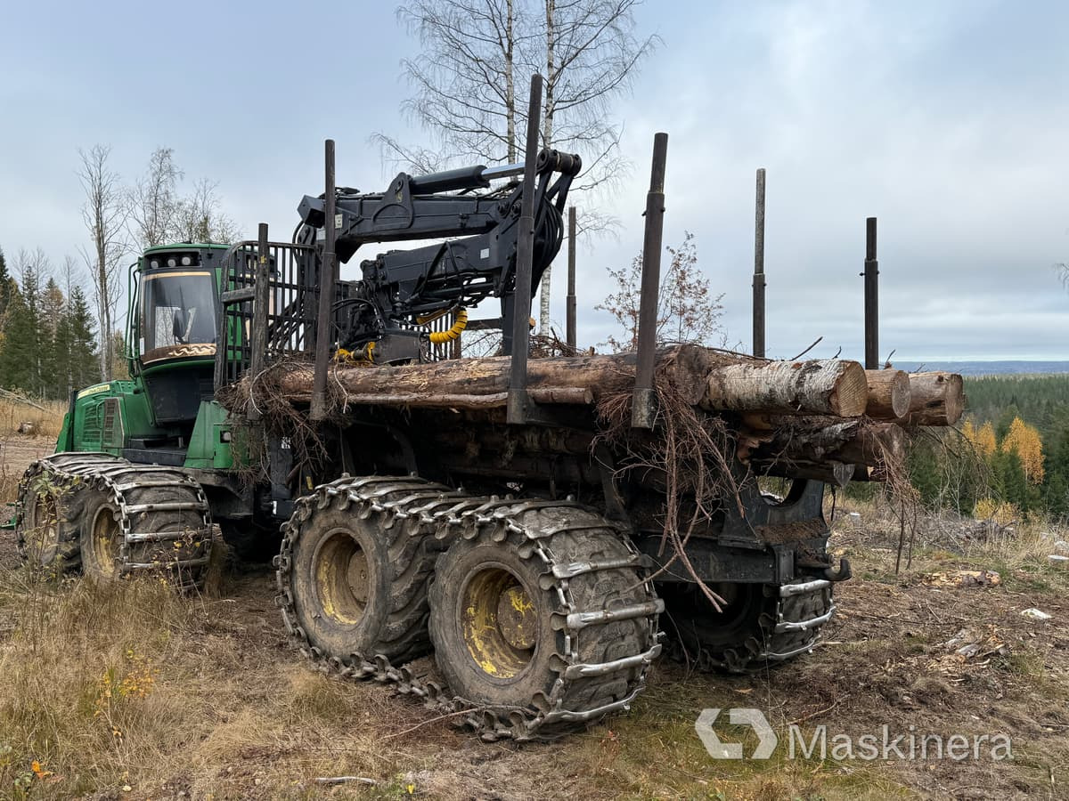 Skotare John Deere 1210E - حافلة الغابات: صورة 3 Skotare John Deere 1210E - حافلة الغابات: صورة 3