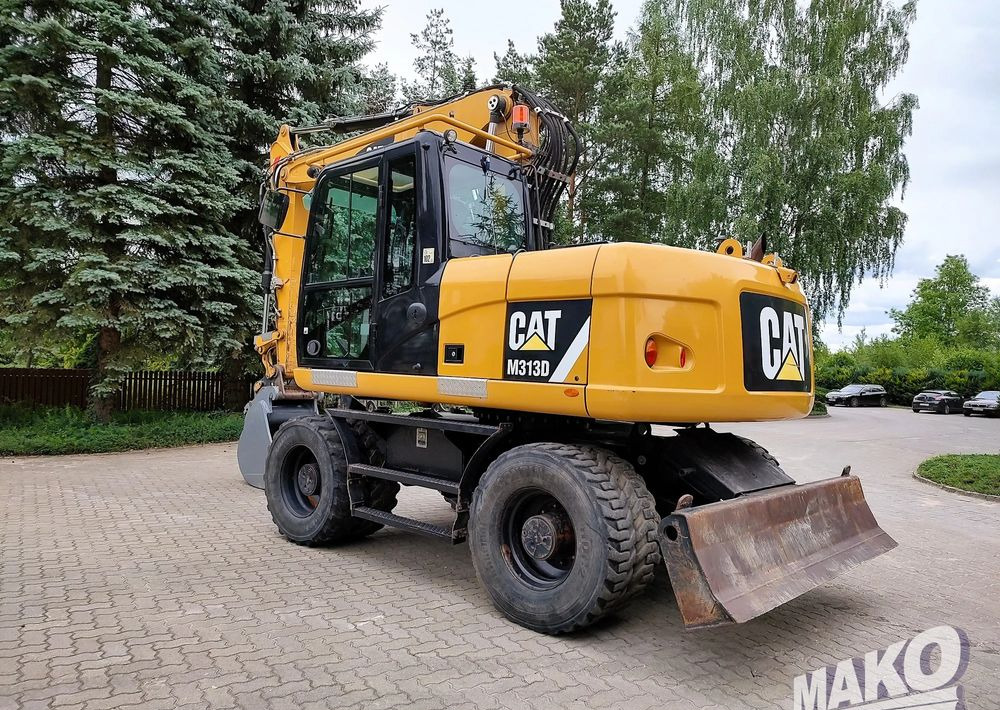 Caterpillar M313D - حفارة دولاب: صورة 2 Caterpillar M313D - حفارة دولاب: صورة 2