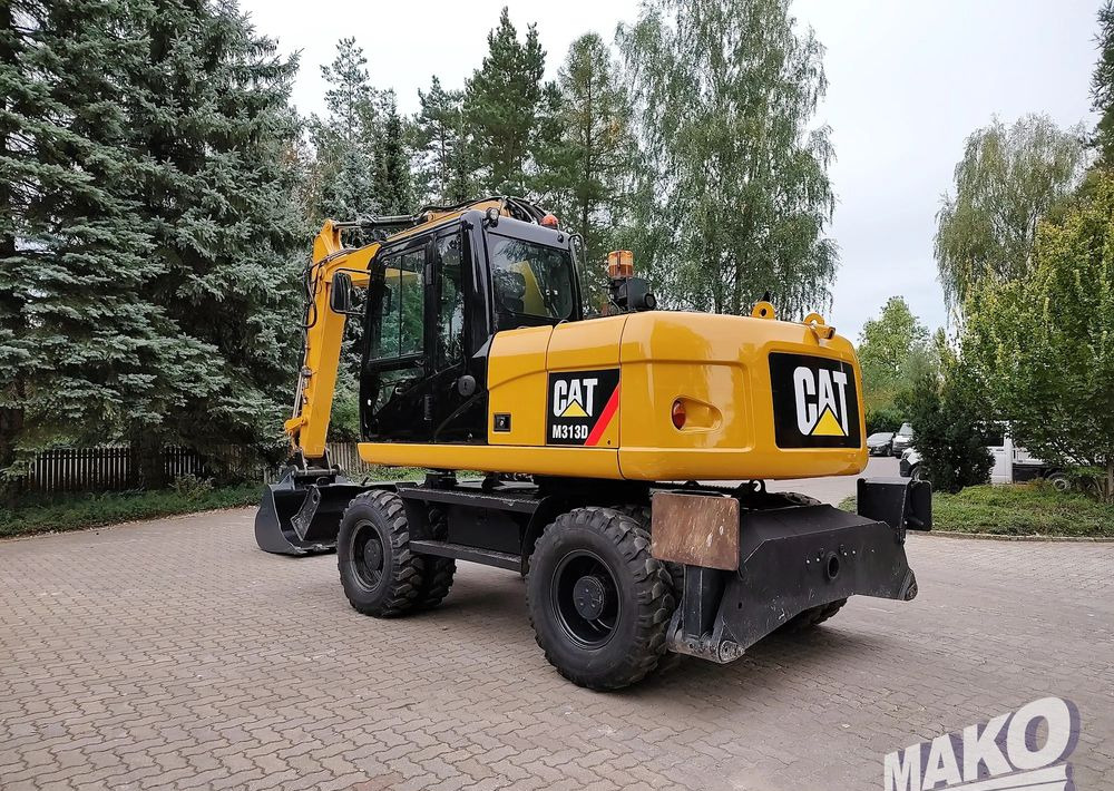 Caterpillar M313D - حفارة دولاب: صورة 2 Caterpillar M313D - حفارة دولاب: صورة 2