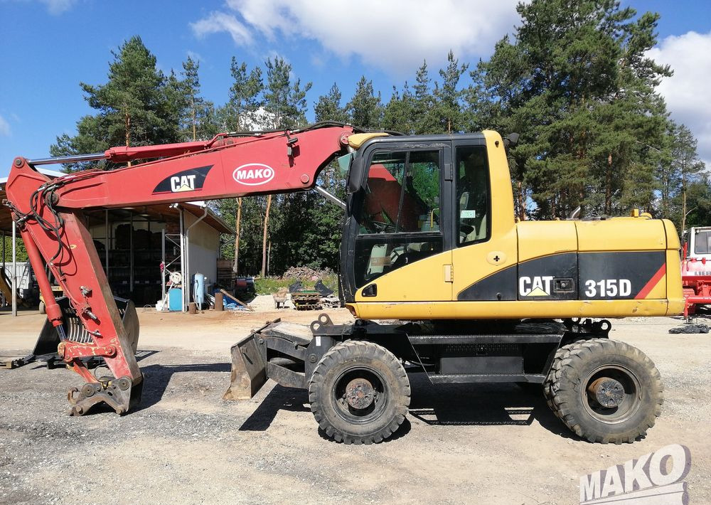 Caterpillar M315 C - حفارة دولاب: صورة 2 Caterpillar M315 C - حفارة دولاب: صورة 2