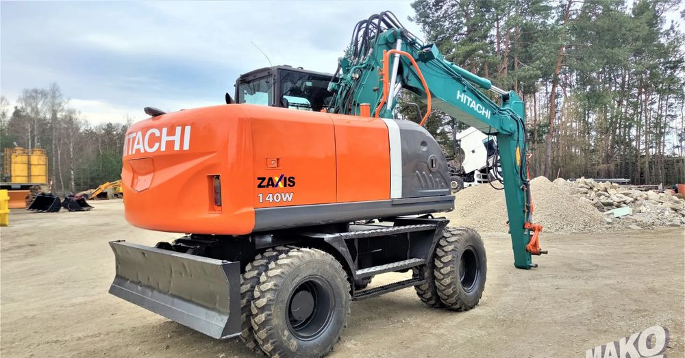 Hitachi ZX140W-3 - حفارة دولاب: صورة 4 Hitachi ZX140W-3 - حفارة دولاب: صورة 4