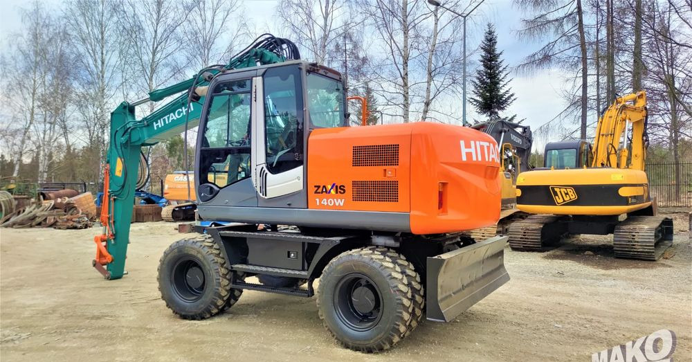 Hitachi ZX140W-3 - حفارة دولاب: صورة 2 Hitachi ZX140W-3 - حفارة دولاب: صورة 2