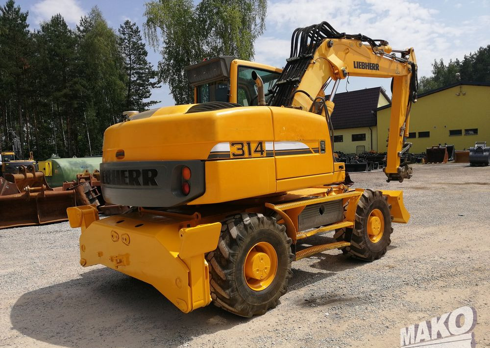 Liebherr A 314 Litronic - حفارة دولاب: صورة 5 Liebherr A 314 Litronic - حفارة دولاب: صورة 5