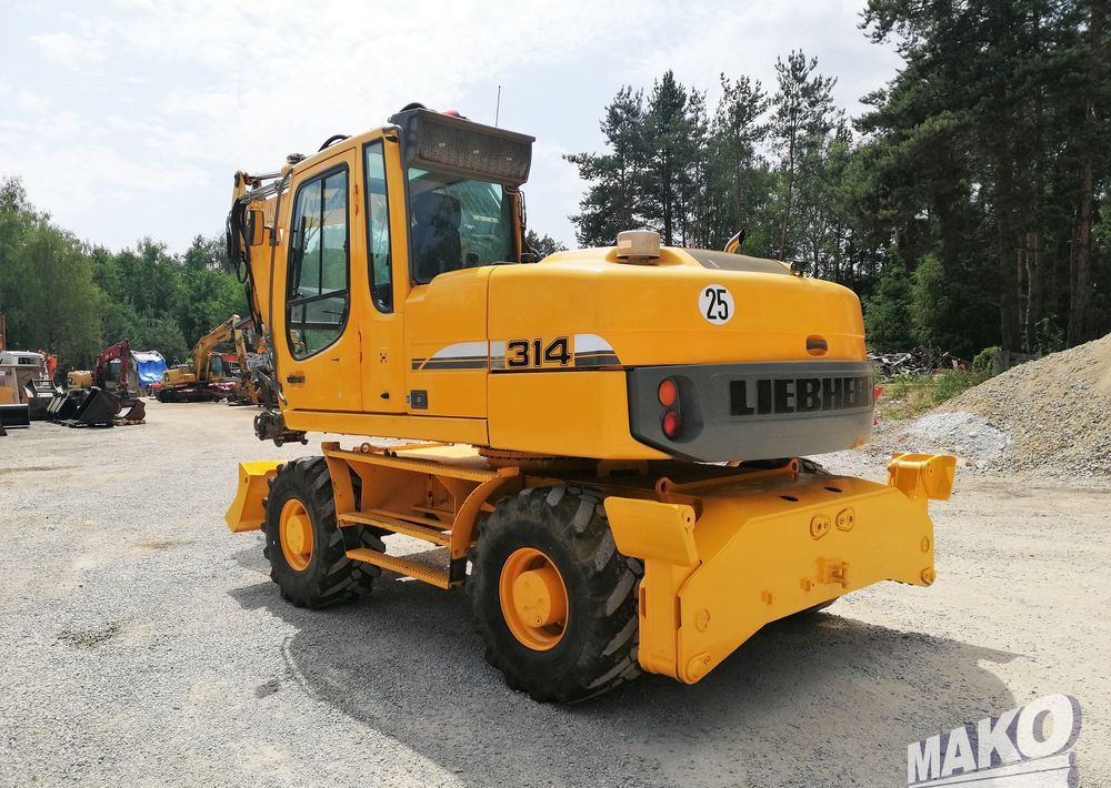 Liebherr A 314 Litronic - حفارة دولاب: صورة 3 Liebherr A 314 Litronic - حفارة دولاب: صورة 3