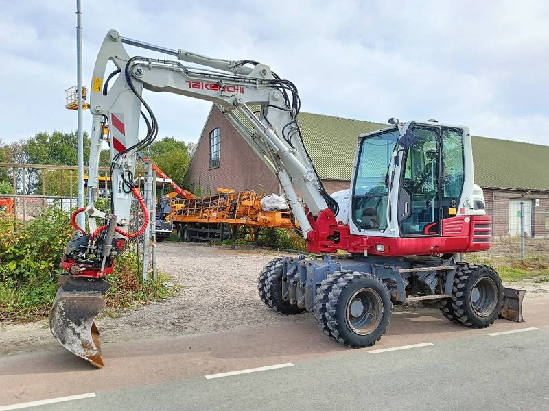 Takeuchi TB 295 W mobiele graafmachine mobile excavator - حفارة دولاب: صورة 1 Takeuchi TB 295 W mobiele graafmachine mobile excavator - حفارة دولاب: صورة 1
