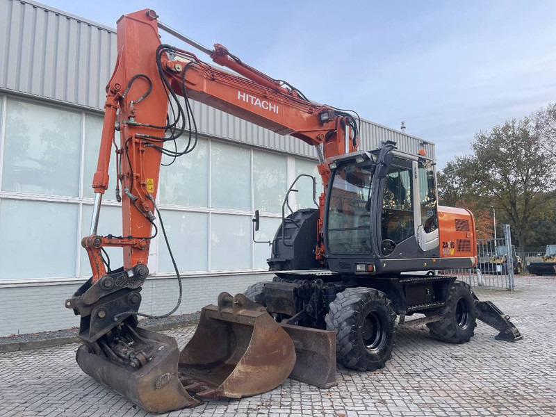 Hitachi ZX 140 W-3 - حفارة دولاب: صورة 1 Hitachi ZX 140 W-3 - حفارة دولاب: صورة 1