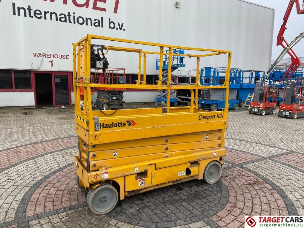 Haulotte Compact 10N Electric Scissor Work Lift 1000cm - رافعة هيدروليكية مقصية: صورة 1 Haulotte Compact 10N Electric Scissor Work Lift 1000cm - رافعة هيدروليكية مقصية: صورة 1