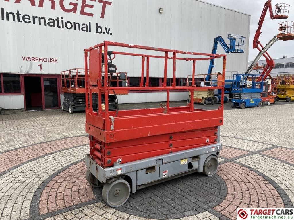 Haulotte Compact 10N Electric Scissor Work Lift 1000cm - رافعة هيدروليكية مقصية: صورة 1 Haulotte Compact 10N Electric Scissor Work Lift 1000cm - رافعة هيدروليكية مقصية: صورة 1