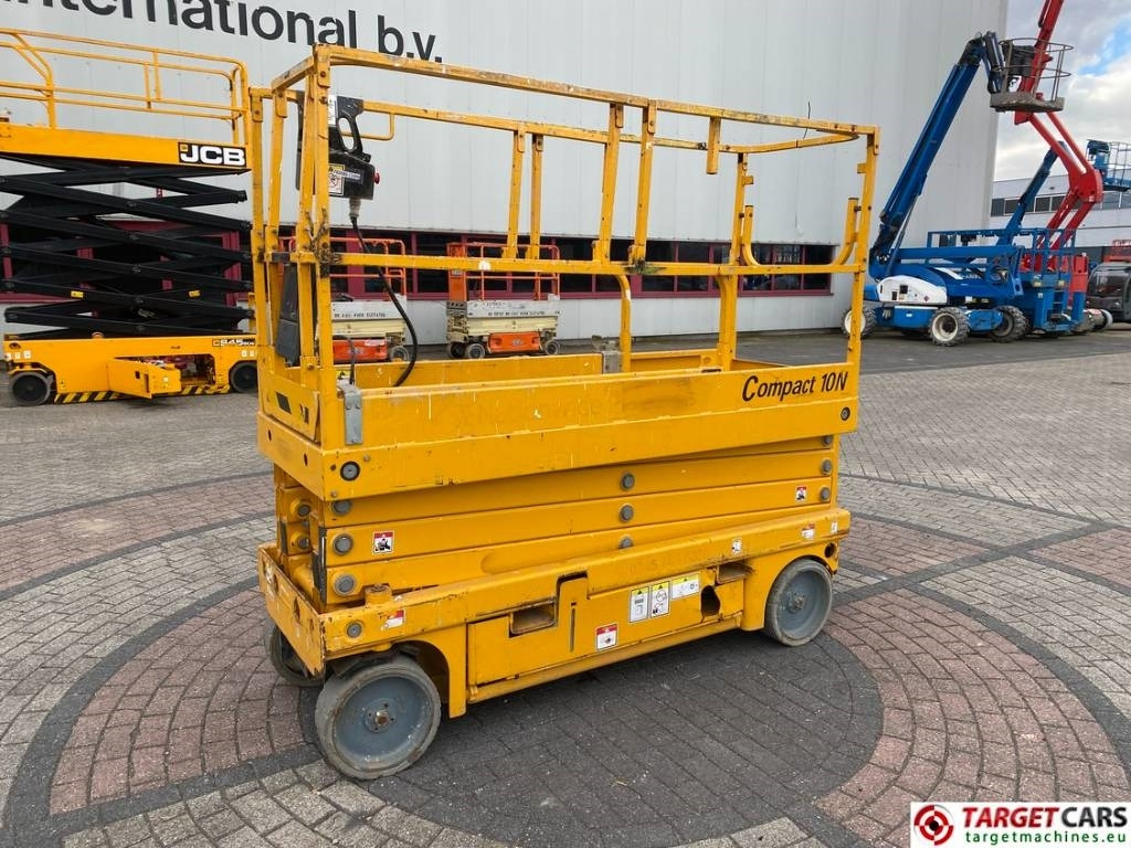 Haulotte Compact 10N Electric Scissor Work Lift 1000cm - رافعة هيدروليكية مقصية: صورة 1 Haulotte Compact 10N Electric Scissor Work Lift 1000cm - رافعة هيدروليكية مقصية: صورة 1