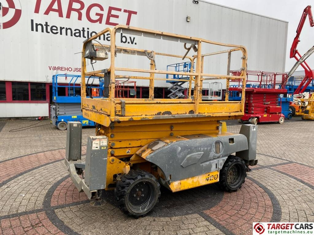 Haulotte Compact 12DX Diesel 4x4 Scissor Work Lift 1206cm - رافعة هيدروليكية مقصية: صورة 1 Haulotte Compact 12DX Diesel 4x4 Scissor Work Lift 1206cm - رافعة هيدروليكية مقصية: صورة 1