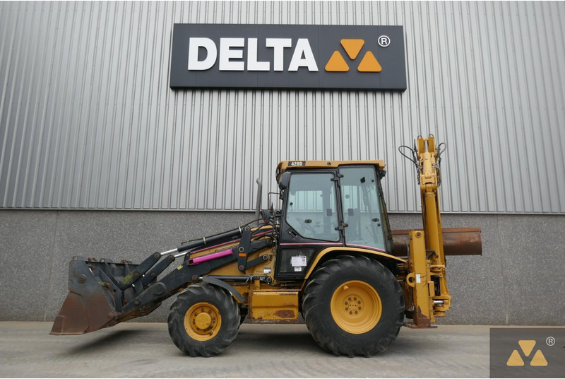 Caterpillar 428D - جرافة حفار: صورة 1 Caterpillar 428D - جرافة حفار: صورة 1