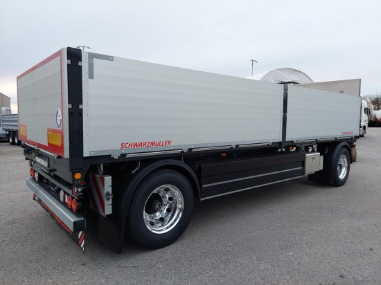 Schwarzmüller 2-Achs Jumbo-Baustoff-Plateauanhänger, BPW-Achsen, Alufelgen, - مقطورات مسطحة: صورة 4 Schwarzmüller 2-Achs Jumbo-Baustoff-Plateauanhänger, BPW-Achsen, Alufelgen, - مقطورات مسطحة: صورة 4