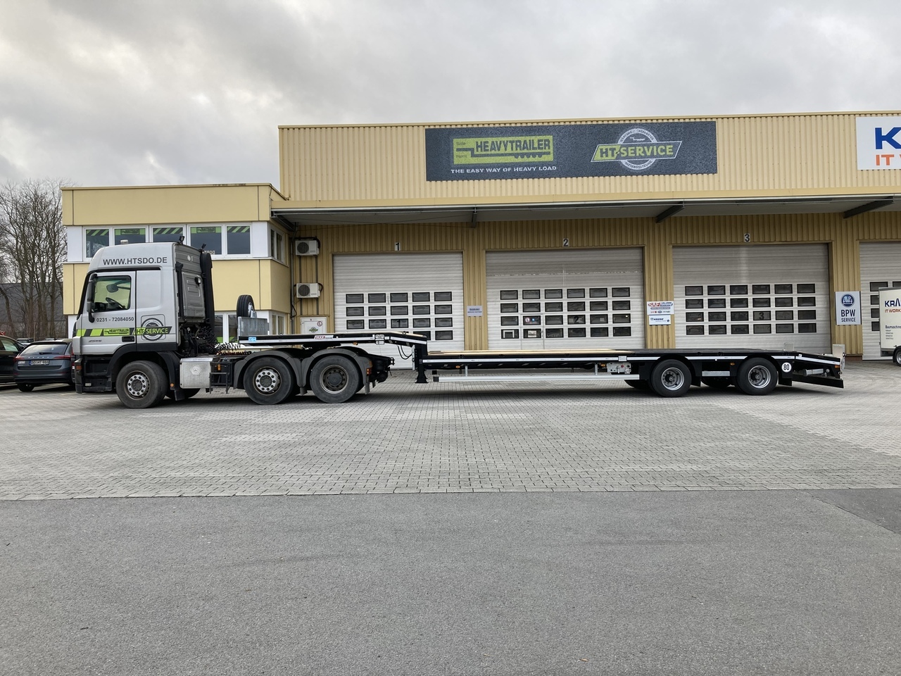 FAYMONVILLE MAX Trailer 2-Achs-Semi zwangsgelenkt - عربة منخفضة مسطحة نصف مقطورة: صورة 1 FAYMONVILLE MAX Trailer 2-Achs-Semi zwangsgelenkt - عربة منخفضة مسطحة نصف مقطورة: صورة 1