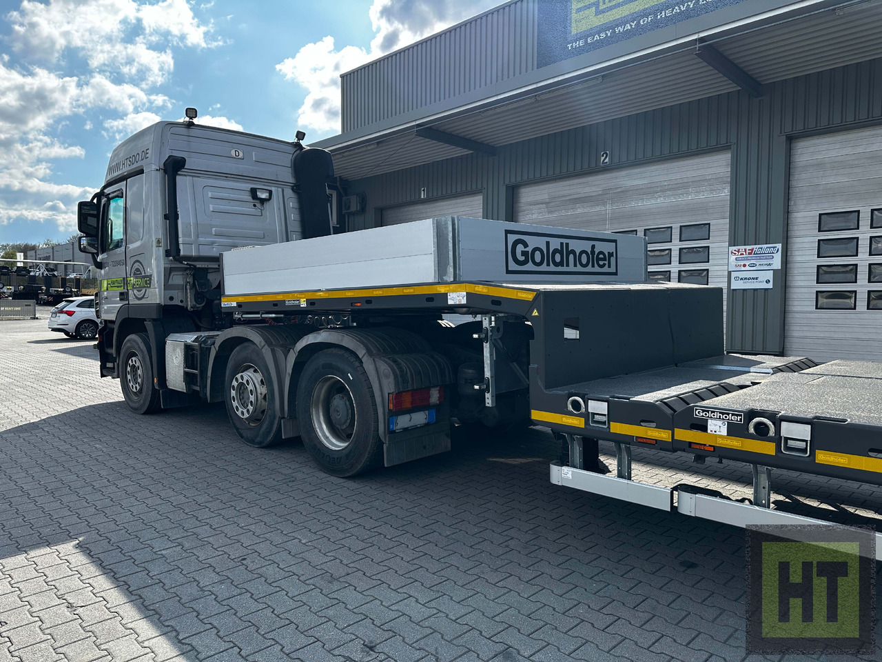Goldhofer 4-Achs-Tele-Semi mit hydr. Doppelklapprampen - عربة منخفضة مسطحة نصف مقطورة: صورة 3 Goldhofer 4-Achs-Tele-Semi mit hydr. Doppelklapprampen - عربة منخفضة مسطحة نصف مقطورة: صورة 3