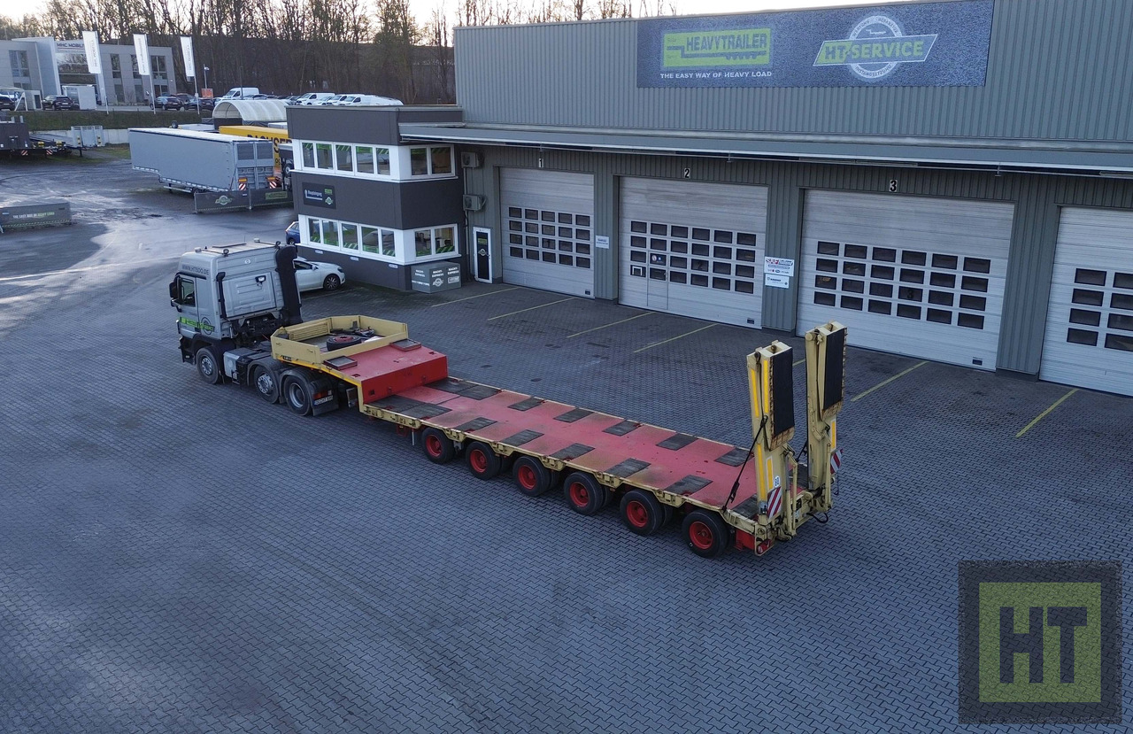 Goldhofer 6-Achs-Tele-Semi mit hydr. Rampen-zwangsgelenkt - عربة منخفضة مسطحة نصف مقطورة: صورة 1 Goldhofer 6-Achs-Tele-Semi mit hydr. Rampen-zwangsgelenkt - عربة منخفضة مسطحة نصف مقطورة: صورة 1