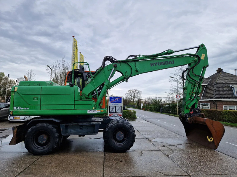 Hyundai Robex 160W-9A met 6-cilinder Cummins motor - حفارة دولاب: صورة 2 Hyundai Robex 160W-9A met 6-cilinder Cummins motor - حفارة دولاب: صورة 2