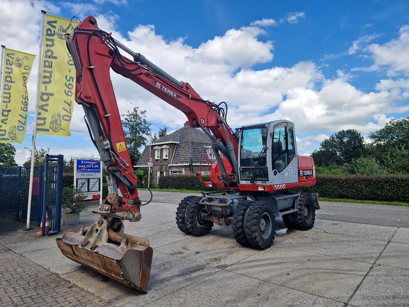 Terex TW160 inclusief kantelbak (1.98m.) - حفارة دولاب: صورة 1 Terex TW160 inclusief kantelbak (1.98m.) - حفارة دولاب: صورة 1