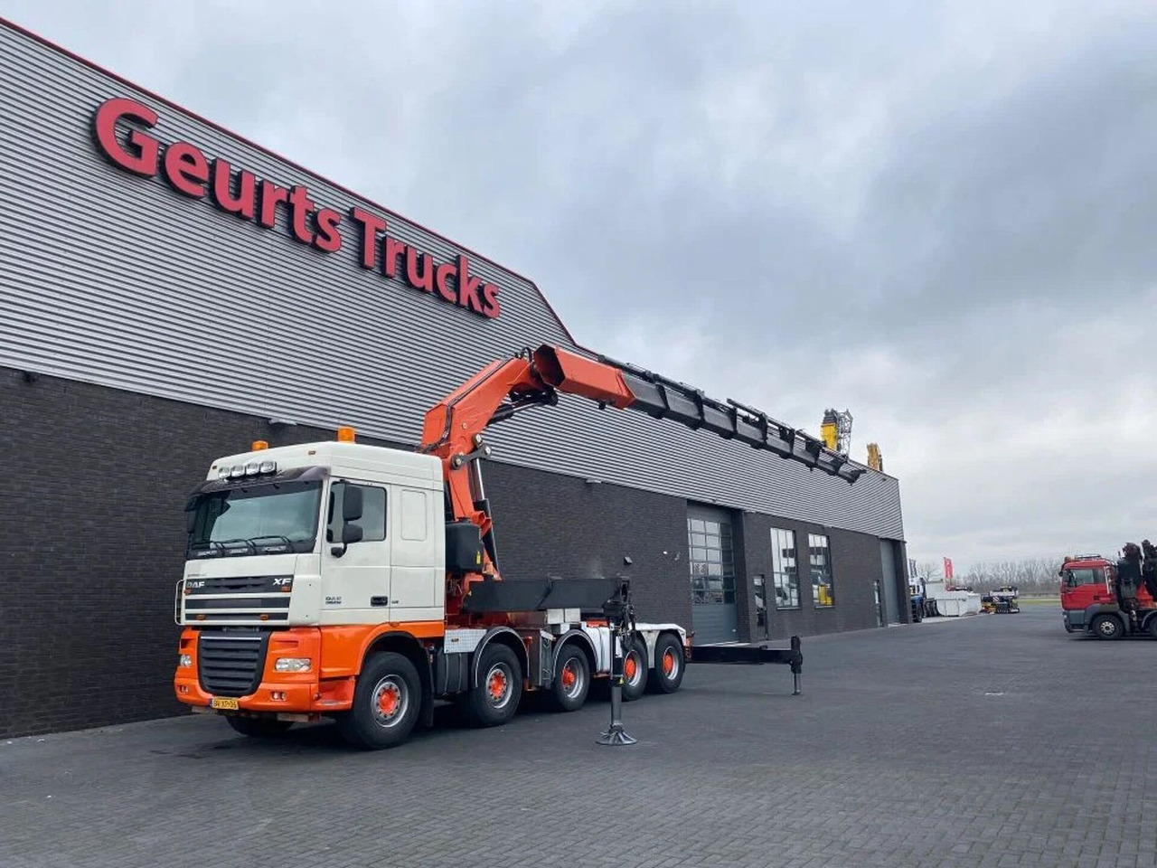 DAF XF 105 10X4 + FASSI F1500AXP.28 KRAAN/KRAN/CRANE - شاحنة كرين: صورة 2 DAF XF 105 10X4 + FASSI F1500AXP.28 KRAAN/KRAN/CRANE - شاحنة كرين: صورة 2