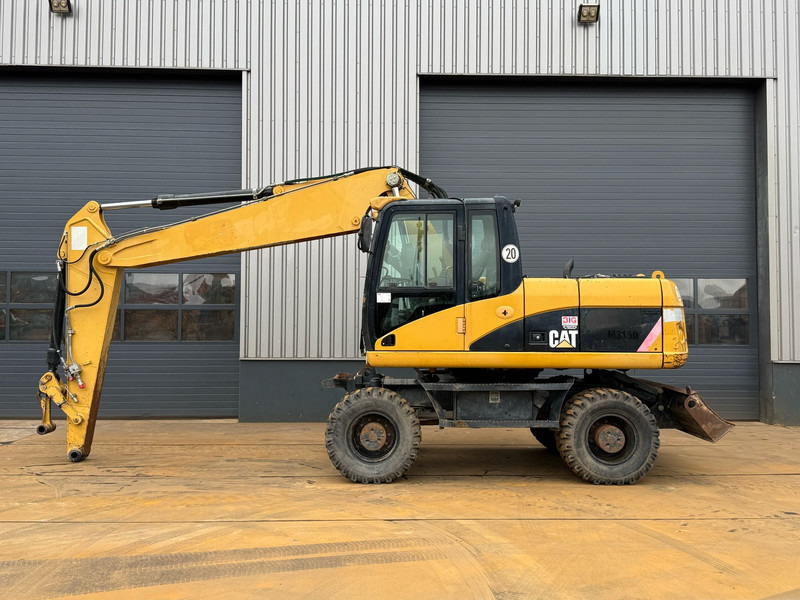 Caterpillar M315D - حفارة دولاب: صورة 1 Caterpillar M315D - حفارة دولاب: صورة 1