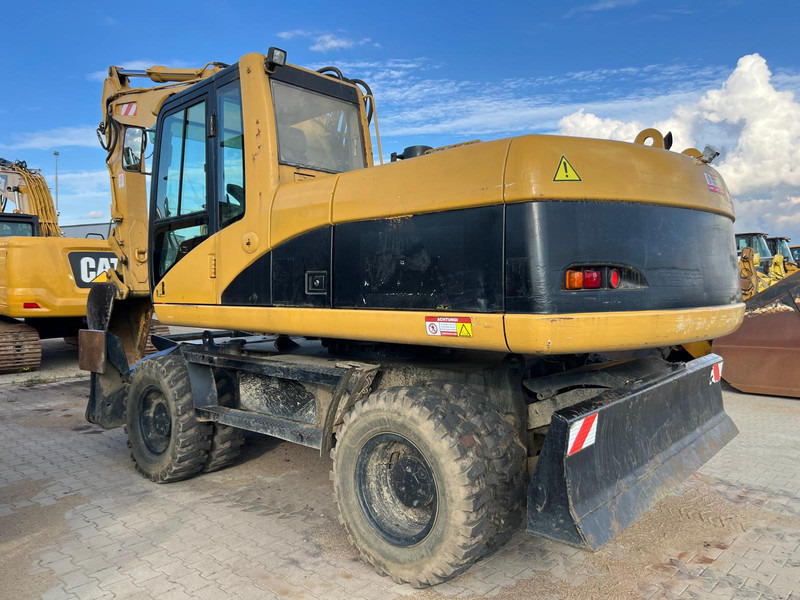 Caterpillar M318C - حفارة: صورة 1 Caterpillar M318C - حفارة: صورة 1