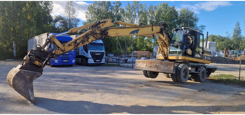 Caterpillar M 315 Rototilt - حفارة دولاب: صورة 4 Caterpillar M 315 Rototilt - حفارة دولاب: صورة 4