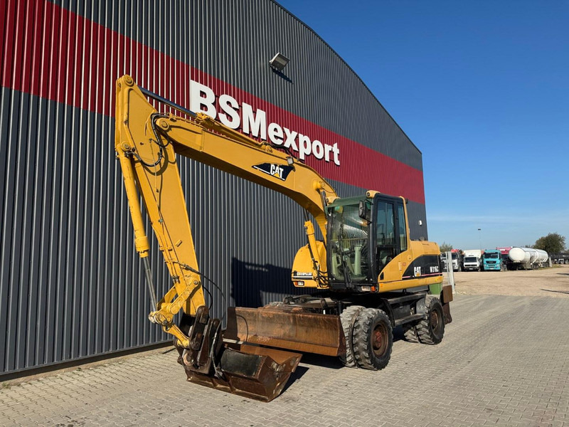 Caterpillar M 316 C - حفارة دولاب: صورة 1 Caterpillar M 316 C - حفارة دولاب: صورة 1