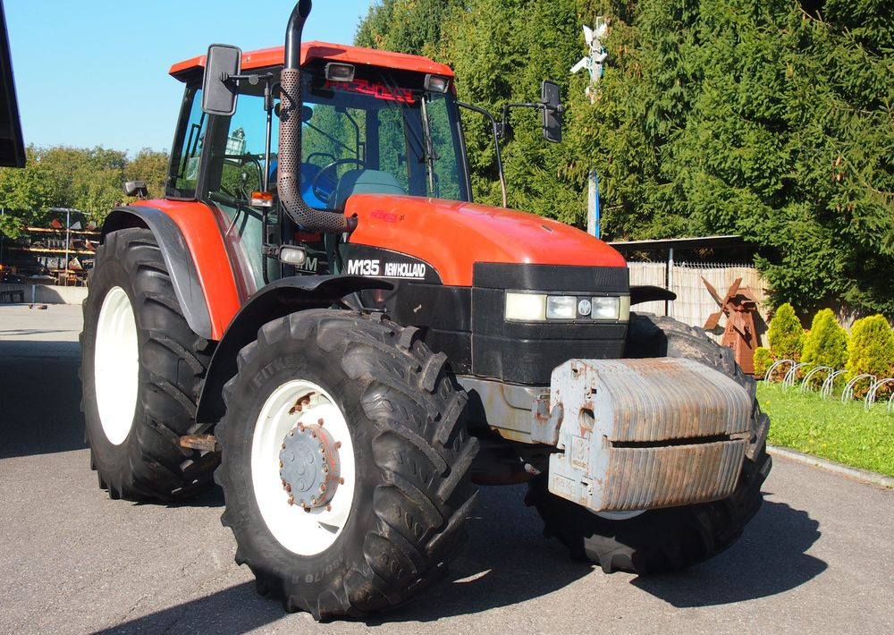 Ciągnik New Holland NH M 135 1998 NEW HOLLAND TM M135 - جرار: صورة 1 Ciągnik New Holland NH M 135 1998 NEW HOLLAND TM M135 - جرار: صورة 1
