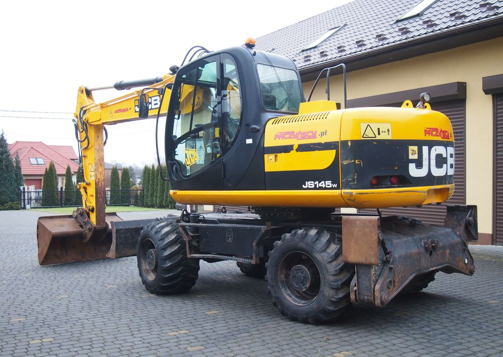 Koparka kołowa JCB JS145W 2011 Koparka JCB - حفارة دولاب: صورة 5 Koparka kołowa JCB JS145W 2011 Koparka JCB - حفارة دولاب: صورة 5