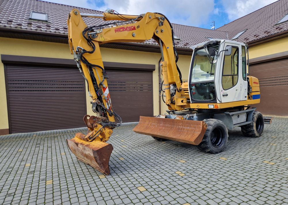 Koparka kołowa Liebherr A311 2008 Liebherr - حفارة دولاب: صورة 1 Koparka kołowa Liebherr A311 2008 Liebherr - حفارة دولاب: صورة 1